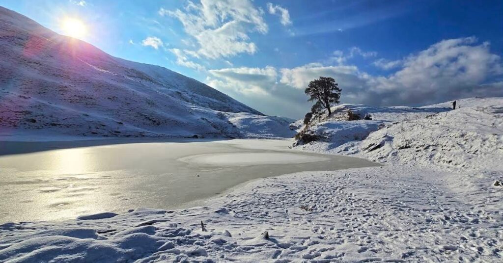 Snow covered trail during Brahmatal trek in Uttarakhand Himalayas in winter season