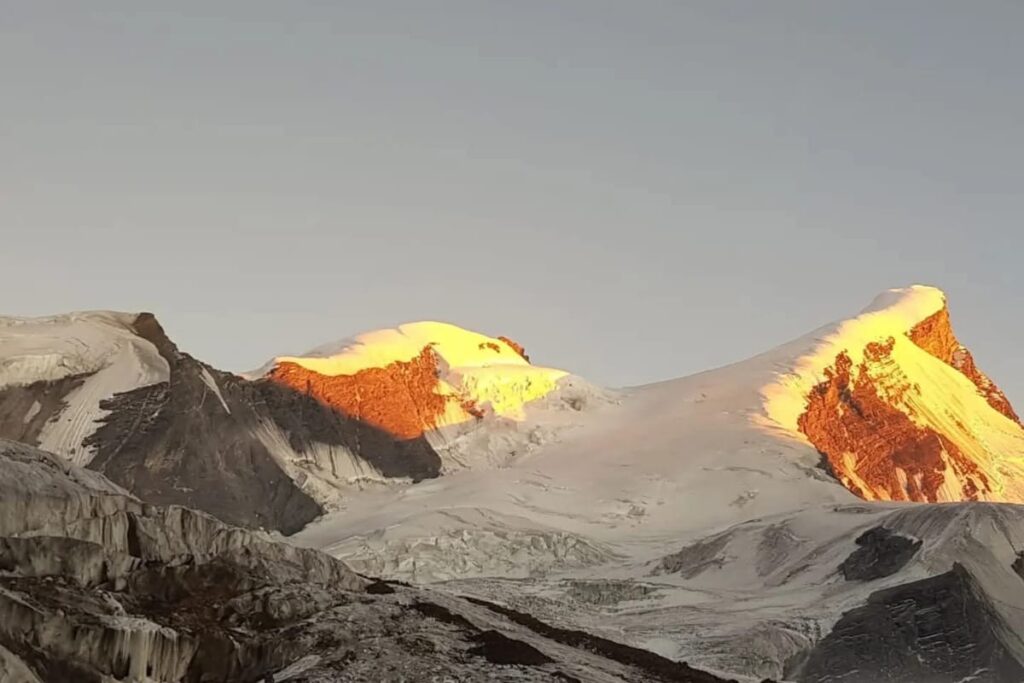 Sunrise view from Black Peak summit showing Himalayan peaks in Uttarakhand Garhwal region