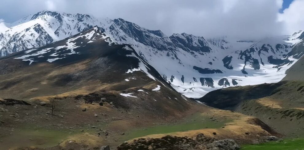 Kyarkoti Lake Trek Uttarakhand with pristine glacial lake and alpine meadow near Harsil Valley