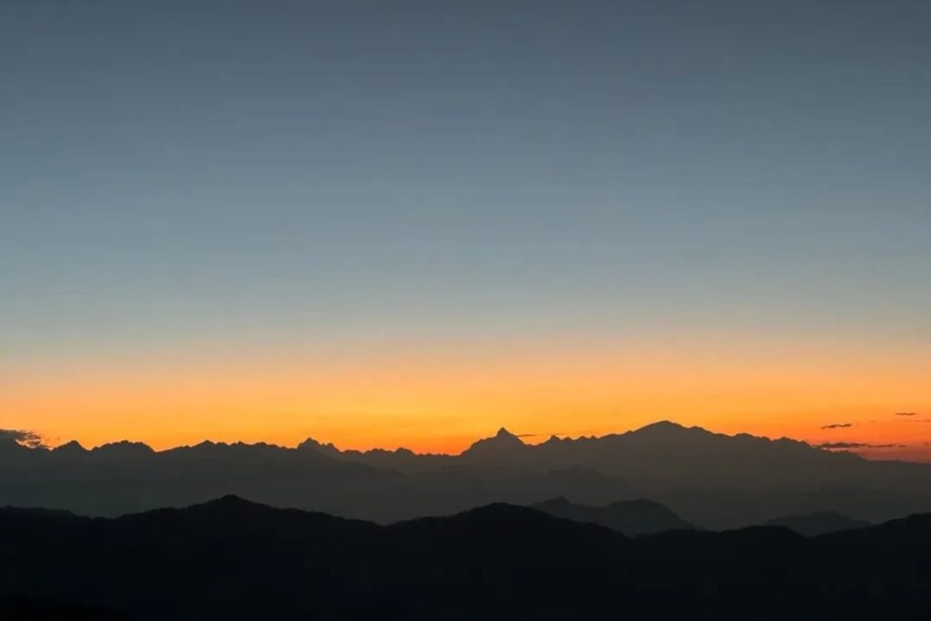 Winter line view from Panwali Kantha Trek during sunset in Uttarakhand Himalayas