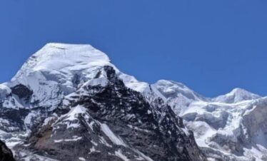 Satopanth Peak summit (7075m) in Garhwal Himalayas with snow-covered ridge and technical climbing route